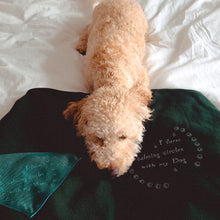 Load image into Gallery viewer, Cute fluffy mini golden doodle dog lying on top on a Hocus Pocus inspired dog and mom matching outfits, graphic print green sweatshirt and dog collar bandana