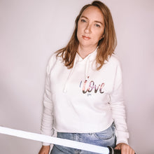 Load image into Gallery viewer, Dog mom holding light saber wearing graphic design white crop hoodie with writing on right chest which reads "I love you". Star wars inspired.