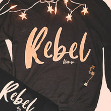 Load image into Gallery viewer, Flatlay of matching black star wars dog mom sweater and dog bandana surrounded by glowing stars and Hans Solos dice